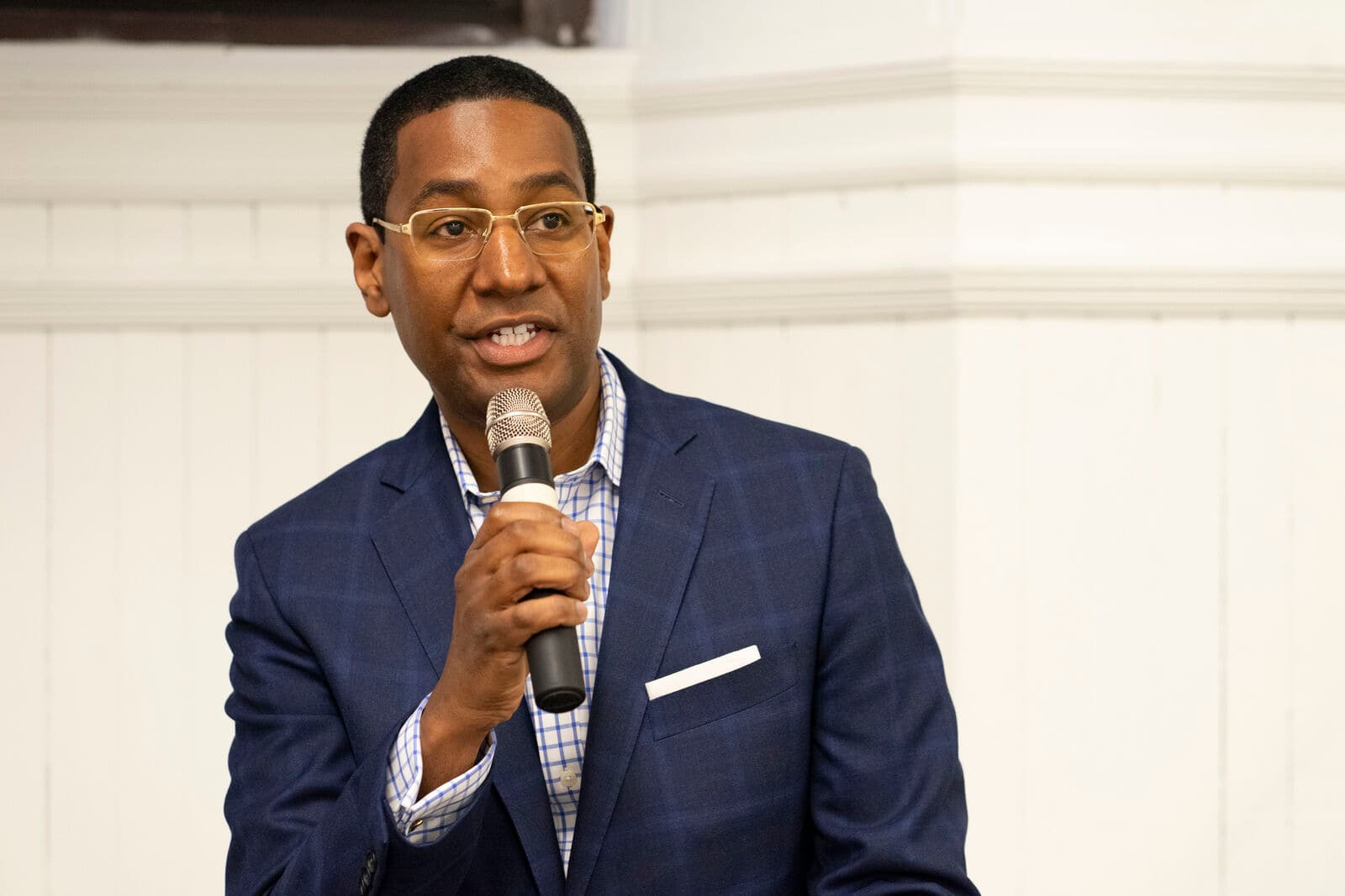 An alumni speaker at a 4A community program