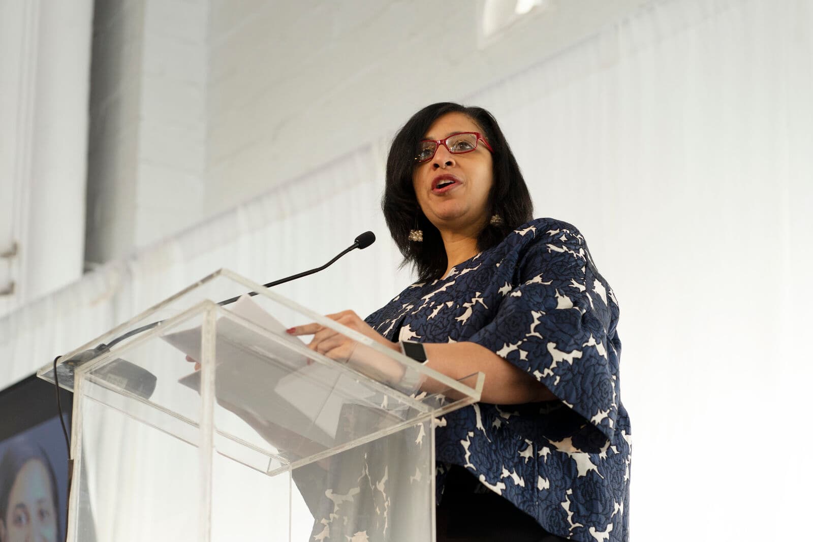 Speaker addressing alumni at a 4A program
